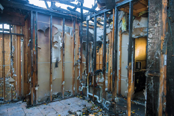 Professional Fire Damage Restoration technician working in University Park, NM